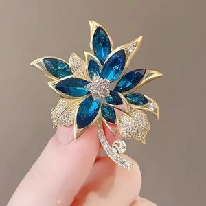 Blue Crystal Flower Brooch Gold Tone Rhinestone Floral Pin Statement